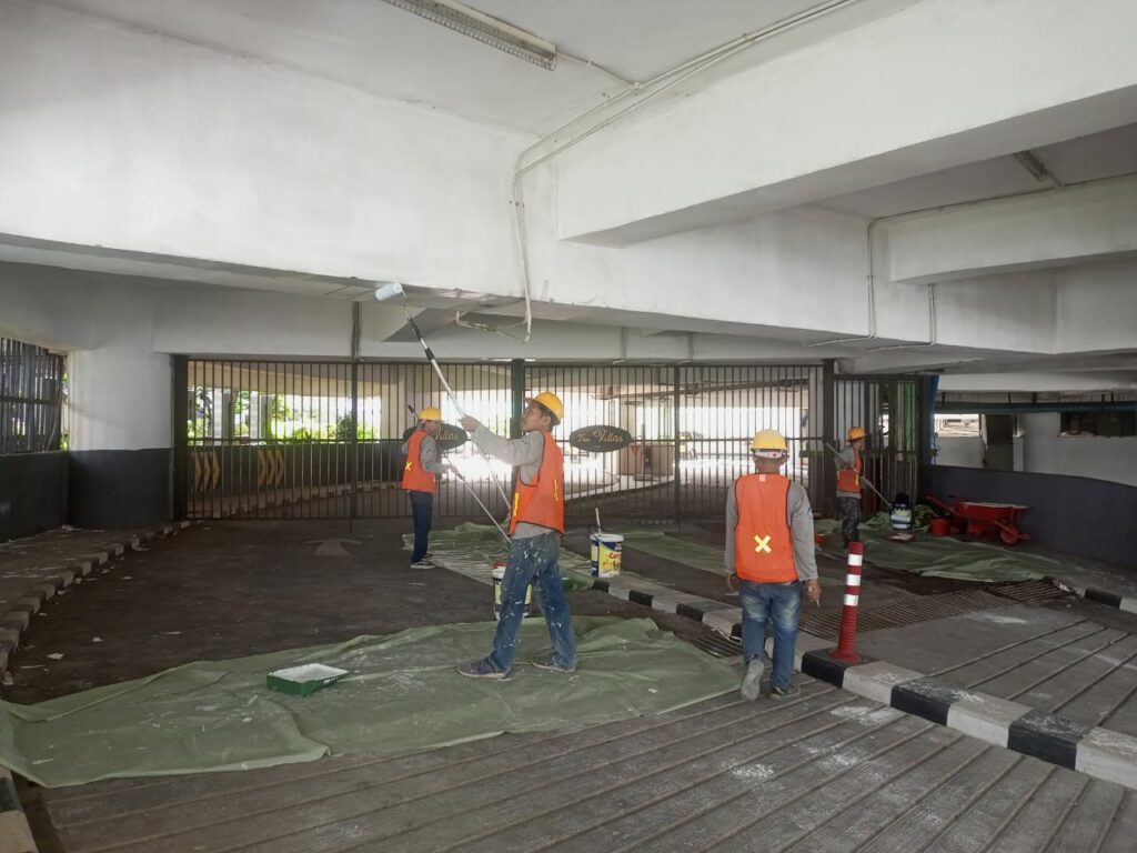 Pengecatan area parkir gedung komersial hasil kerja Tertata